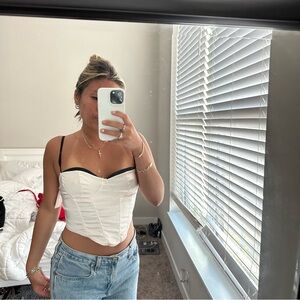 Light pink satin tank top with black trimming